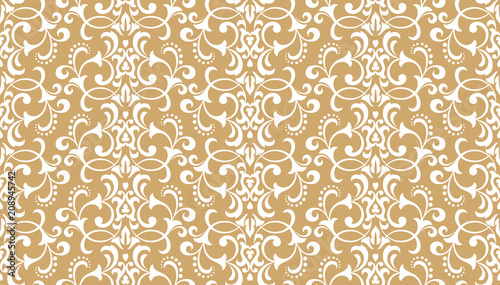 Wallpaper in the style of Baroque. A seamless vector background. White and gold floral ornament. Graphic pattern for fabric, wallpaper, packaging. Ornate Damask flower ornament