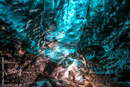 Ice Cave in Vatnajokull, Iceland.The beauty of the caves filled with blue ice.
