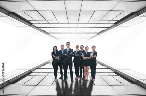 business people professional group of teamwork diverse team standing on windows glass building tunnel background. business team leader power full successful concept.