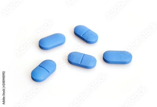 Coloured pills isolated on white background