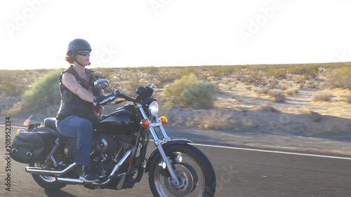 Woman on Motorcyle with Dog