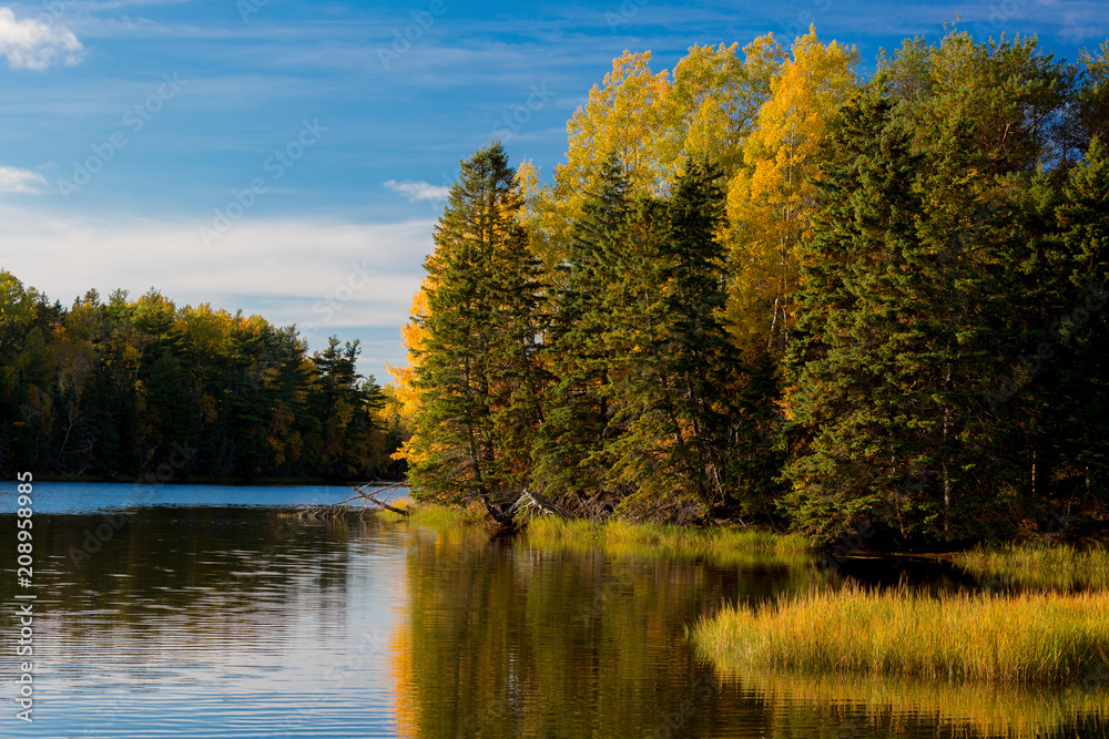 Autumn along a slow moving river. Autumn along a slow moving river.