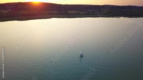 Balatonfuzfo, Hungary - 4K sailboat on Lake Balaton during sunset at Fuzfoi-obol, Balatonfuzfo photo