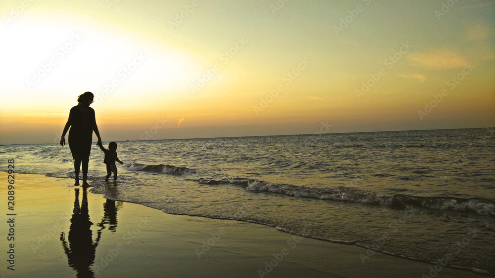 Evening walk during a Sunset in Quram Beach Muscat Oman