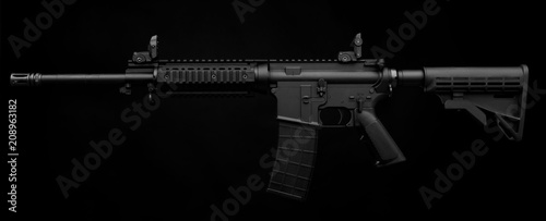 Gun rifle isolated on black