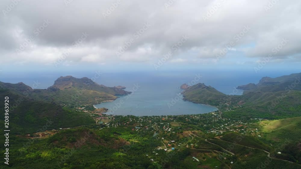 Aerial panoramic view of Taiohae bay on Nuku Hiva island, town of Taiohae - South Pacific Ocean, Marquesas Islands, landscape of French Polynesia from above, 4k Aerial panoramic view of Taiohae bay on Nuku Hiva island, town of Taiohae - South Pacific Ocean, Marquesas Islands, landscape of French Polynesia from above, 4k