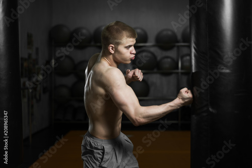 fighter training with a punching bag