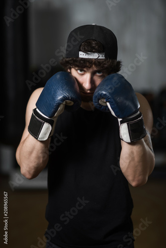 Young boxer in Boxing gloves