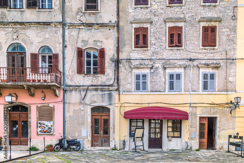 Scruffy facade of an old houses in Pula, Croatia, Europe.