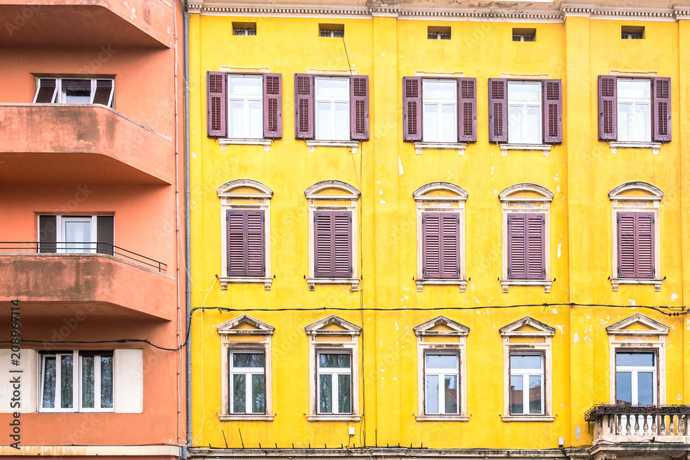 Colorful facade of an old houses in Pula, Croatia, Europe.