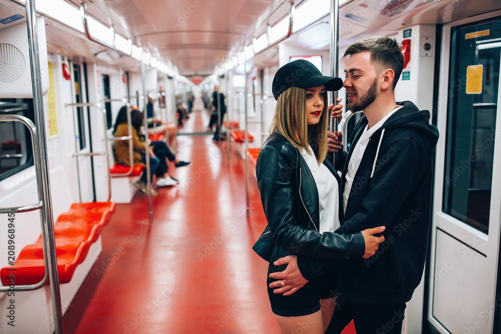 The love story of a guy and a girl in the subway. Young people travel.