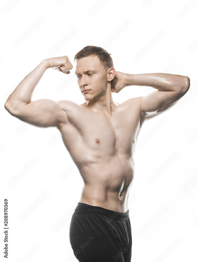 man bodybuilder showing muscular body on white background