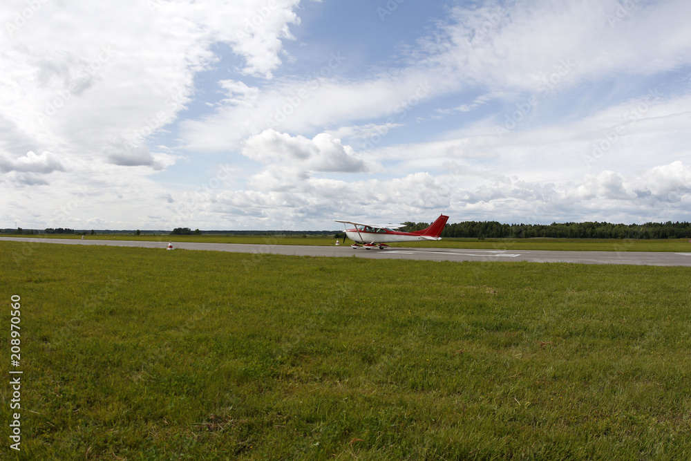 Fototapeta premium A small airplane on the runway.