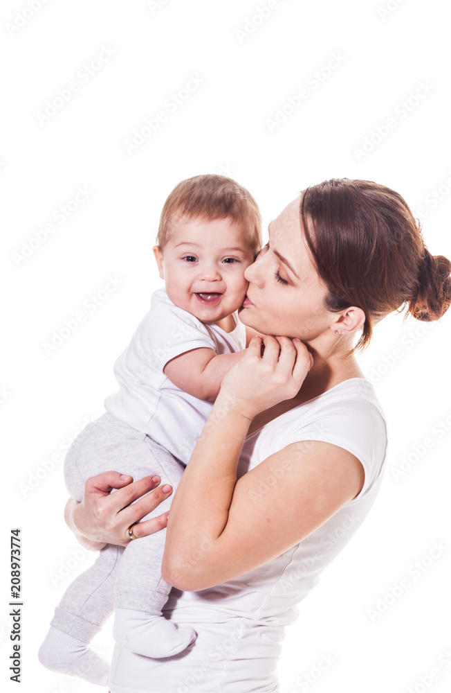 Mother and baby playing and laughing. A happy family Mother and baby playing and laughing. A happy family