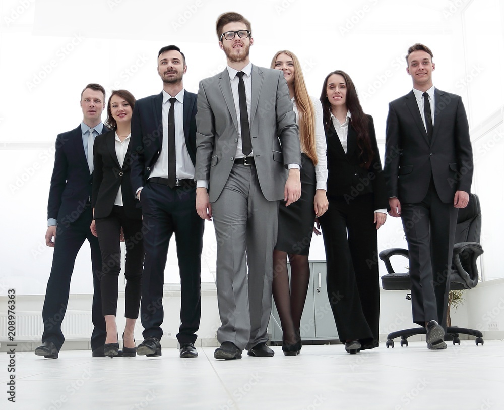 businessman standing in front of her business team businessman standing in front of her business team
