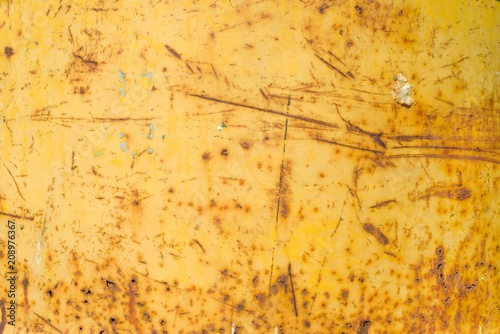 Abstract corroded rusty metal background, texture, yellow brown.