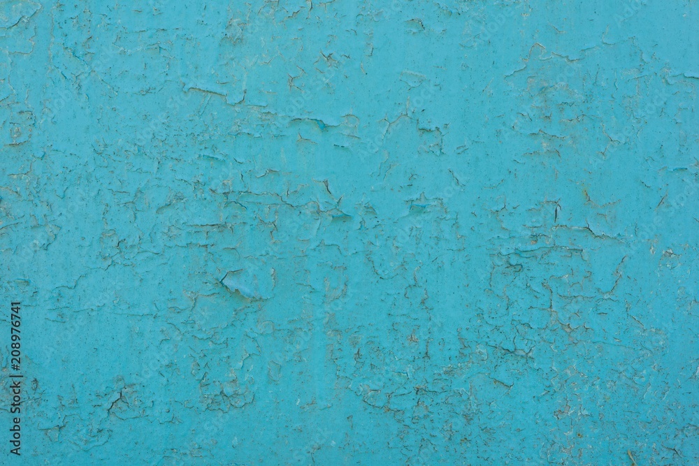 Texture background blue painted cracked iron surface.