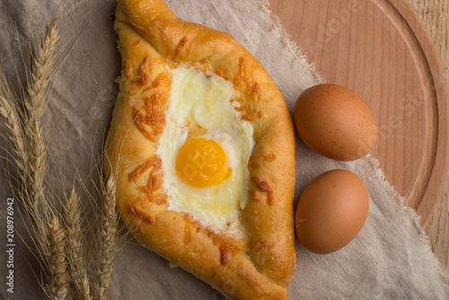 Khachapuri traditional Georgian cheese and egg-filled bread