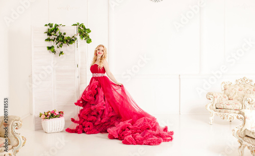Woman in red cloudy dress