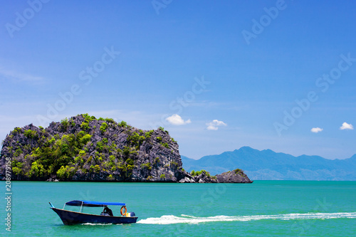 Malaysian boat near beach on the island of Langkawi