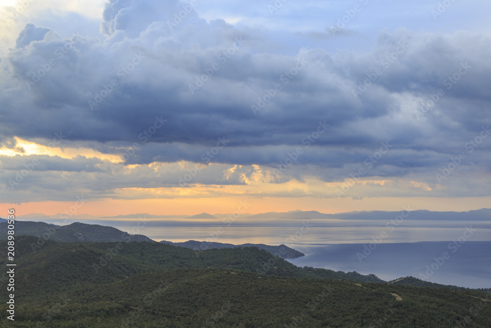 Sunset over Aegean sea from the mountains between datca and marmaris in Turkey