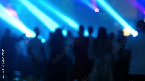 Dancing people out of focus.Laser show HD video