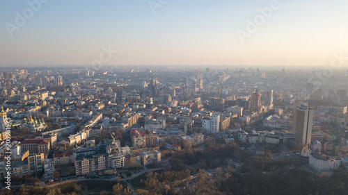 Panoramic aerial view from the drone, a view of the bird's eye view of the the central historical part of the city of Kiev, Ukraine, with old buildings of the city. © artjazz