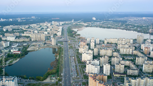 A bird's eye view, aerial panoramic view from drone to the Darnyts'kyi district of Kiev, Ukraine and the left bank of Dnieper.
