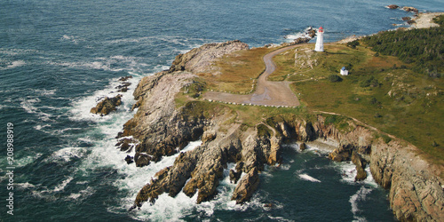 Foto Lighthouse in Louisbourg Nova Scotia Cape Breton along Atlantic Canadian Coastline