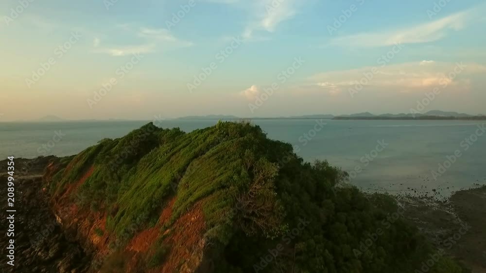 Aerial view of dense forest on Koh Lanta island coast in Thailand. Aerial view of dense forest on Koh Lanta island coast in Thailand.