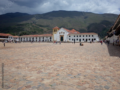 The famous cabble stoned main square of Villa de Leyva, Colombia photo