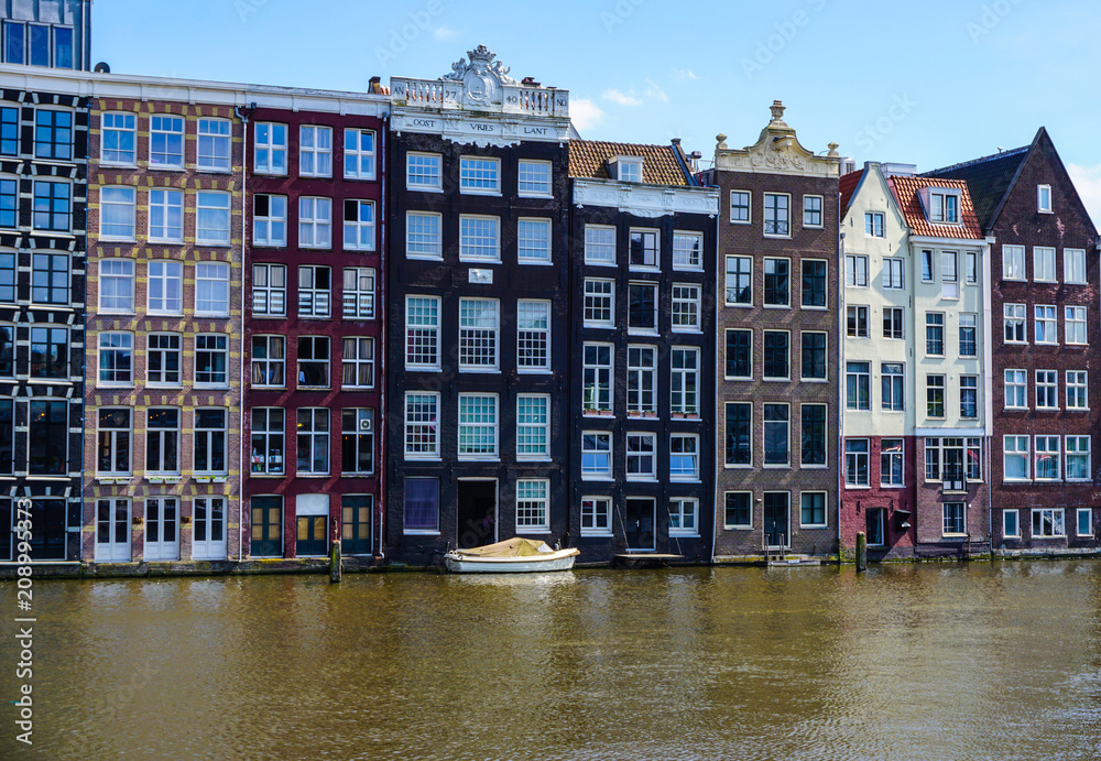 Beautiful center of Amsterdam with canals and brick houses