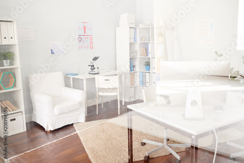 Background image of empty doctors office interior in modern private clinic, copy space © Seventyfour