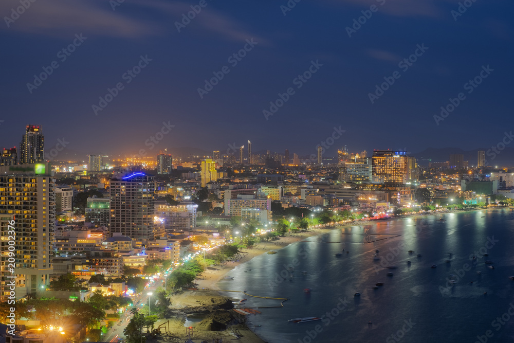 Aerial view of Pattaya City at dusk. Pattaya is the most famous tourist attraction in East of Thailand. . Aerial view of Pattaya City at dusk. Pattaya is the most famous tourist attraction in East of Thailand. .