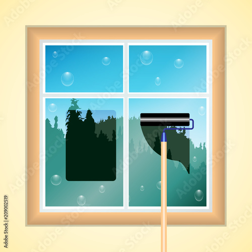 window cleaning, wood and blue sky, brush leaning against the glass.