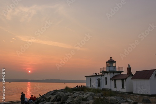 Discovery Park Lighthouse at Sunset © Matthew