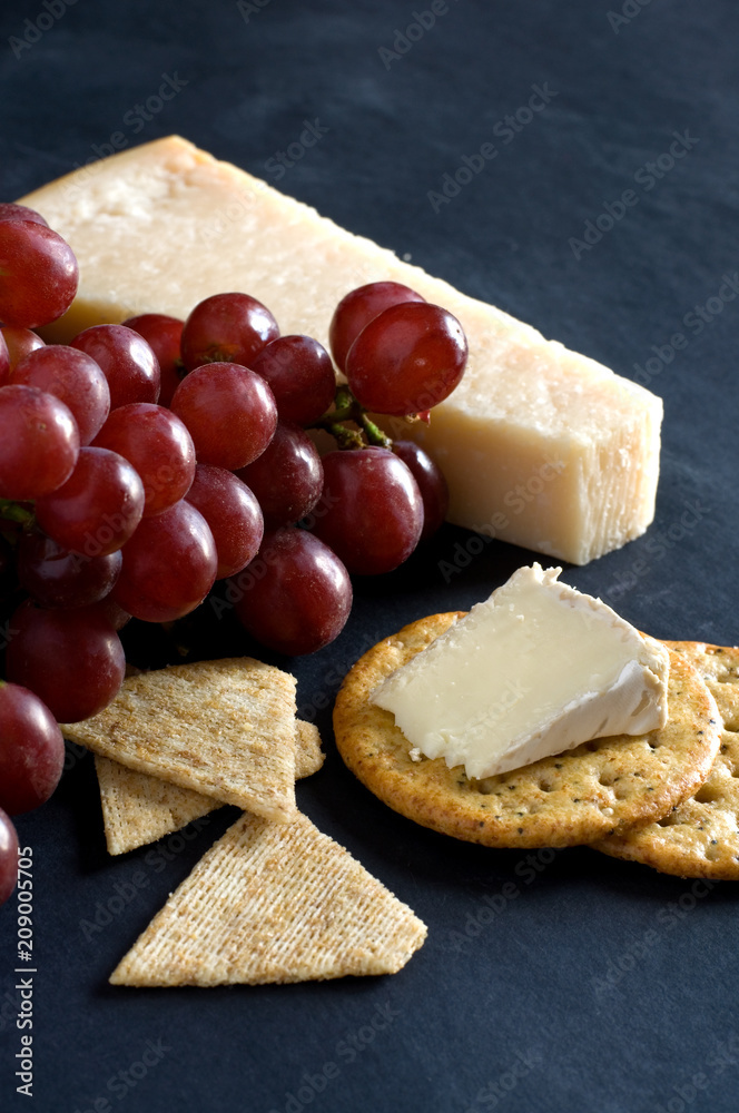 Red Grapes, Cheese and Crackers on Black