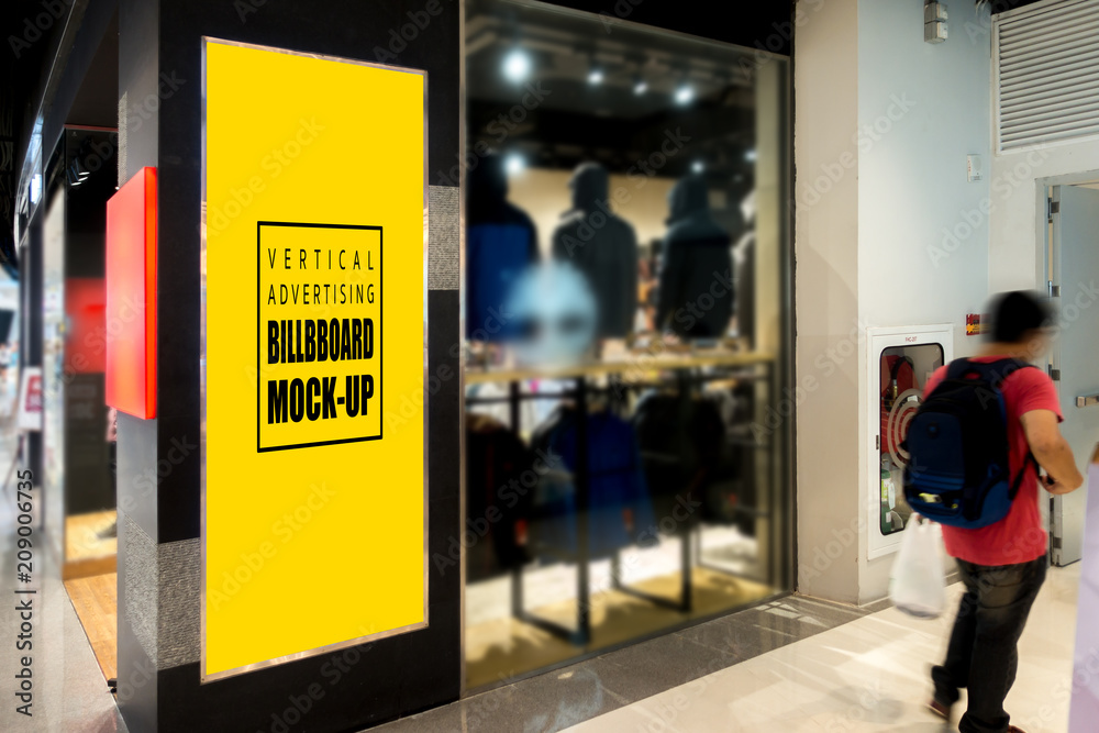 Mock up vertical signboard at the clothing store Mock up vertical signboard at the clothing store