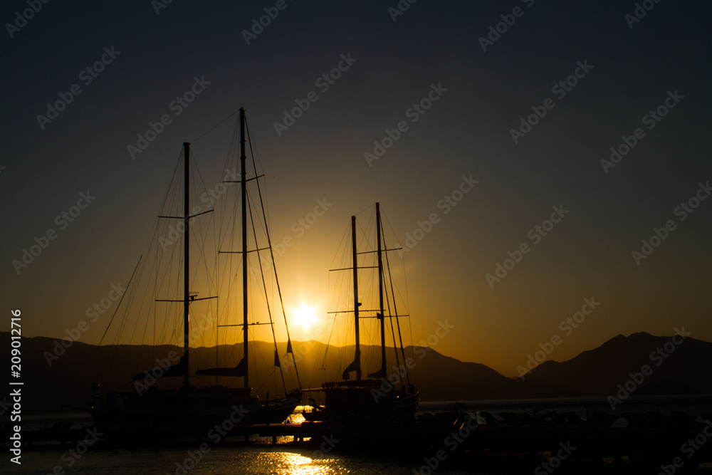 sunrise among the yacht masts in Marmaris,Turkey