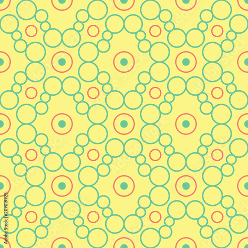 Geometric seamless pattern. Yellow background with pink and green design