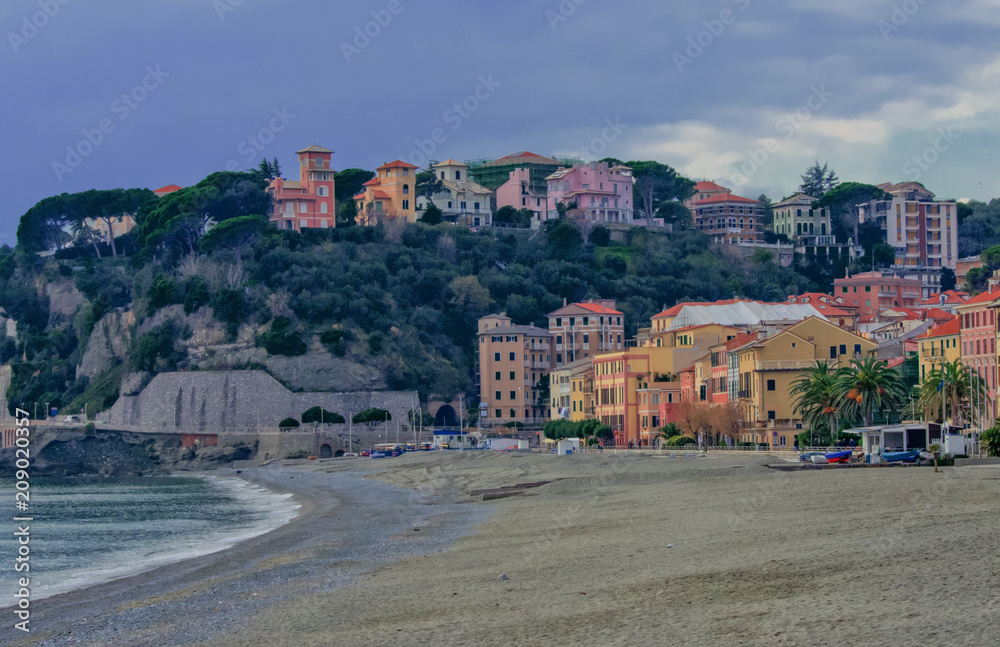 village with houses overlooking the beach with bright colors.Celle Ligure, Italy