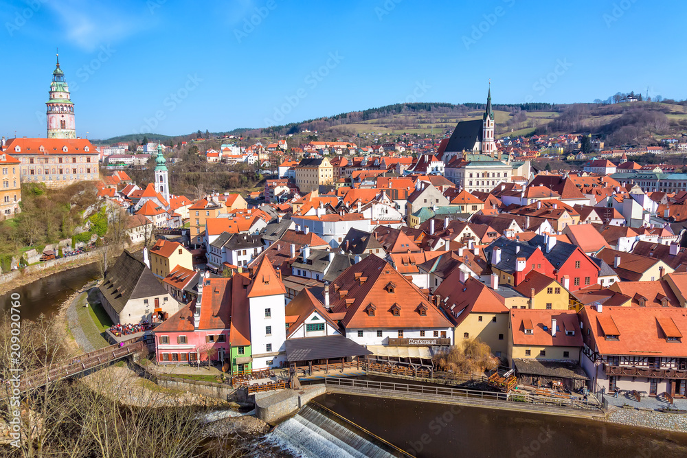 Aerial view panorama of the old Town of Cesky Krumlov in South Bohemia, Czech Republic with blue sky. UNESCO World heritage Site and famous place for tourism