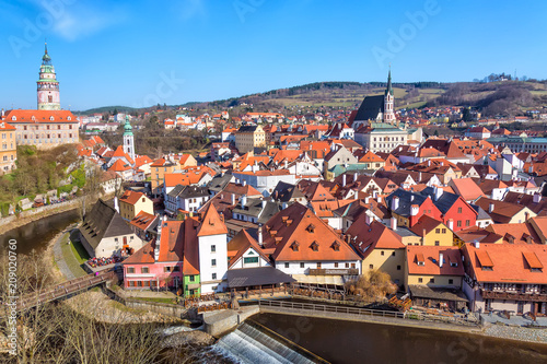 Aerial view panorama of the old Town of Cesky Krumlov in South Bohemia, Czech Republic with blue sky. UNESCO World heritage Site and famous place for tourism