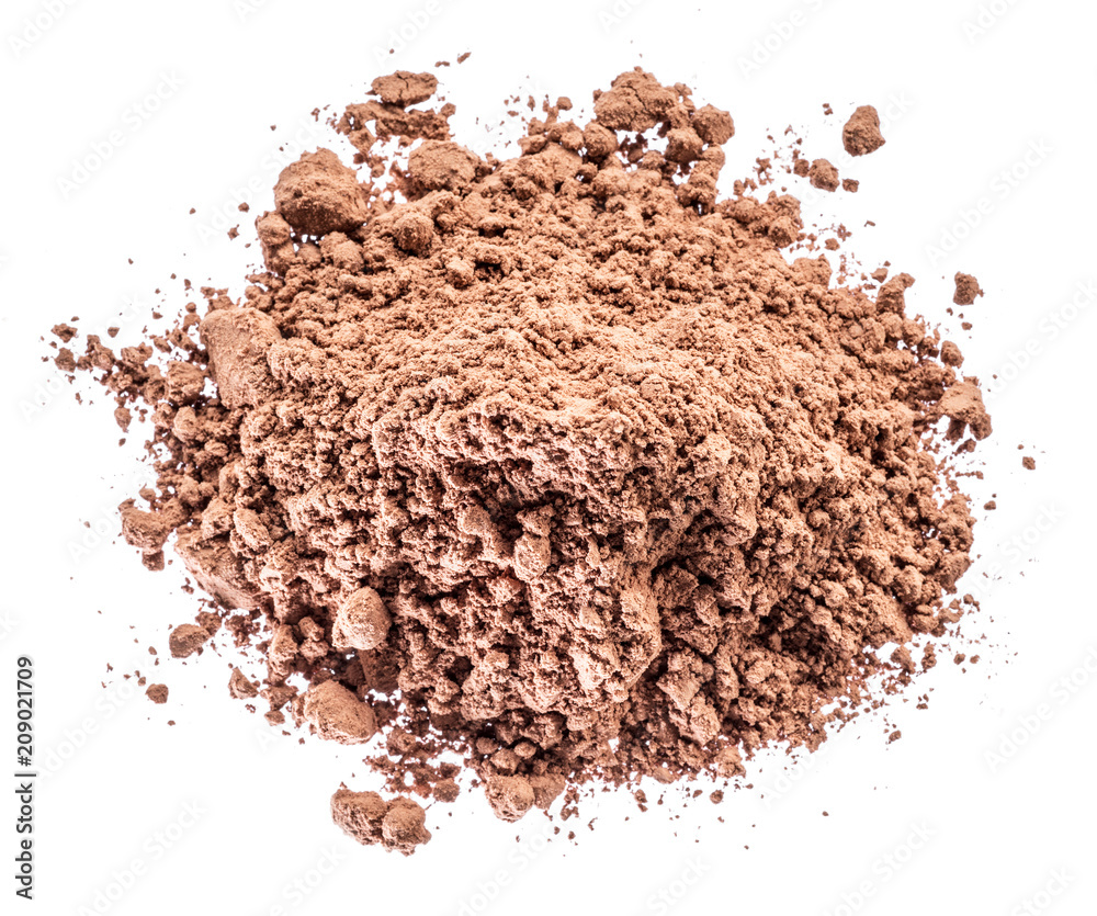 Cocоa powder or carob powder on white background. Cocоa powder or carob powder on white background.