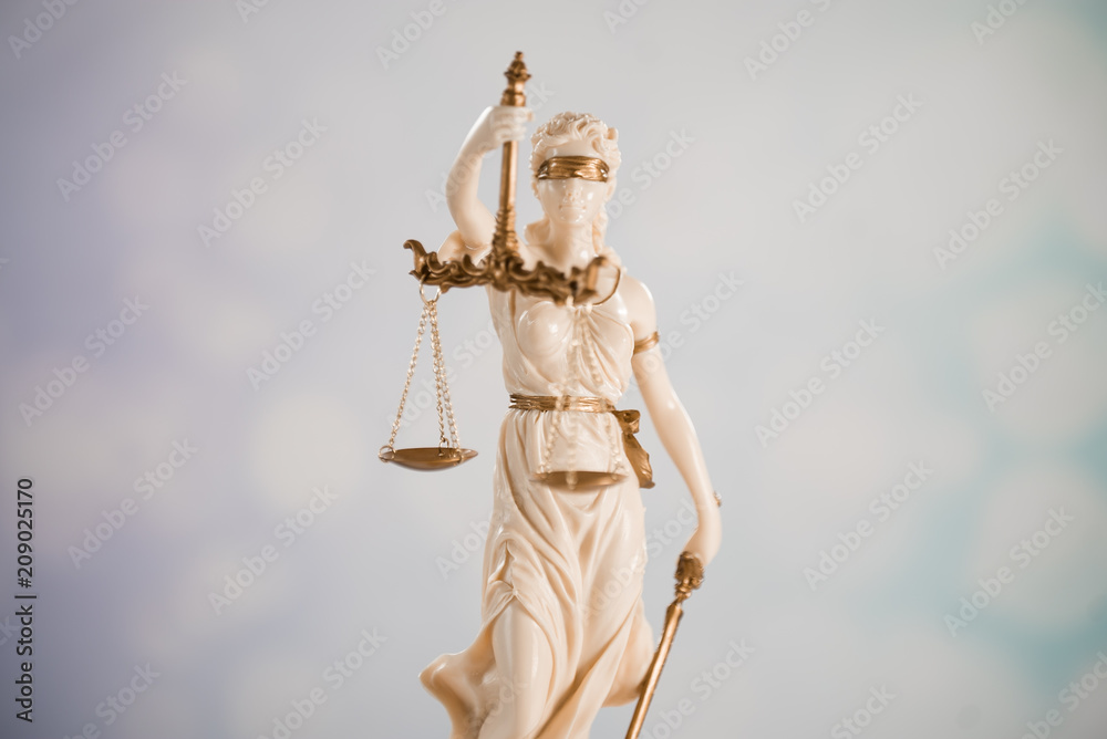 Goddess of justice on a light background