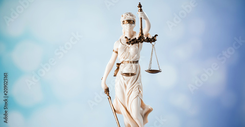 Goddess of justice on a light background