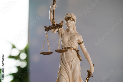 Goddess of justice on a light background