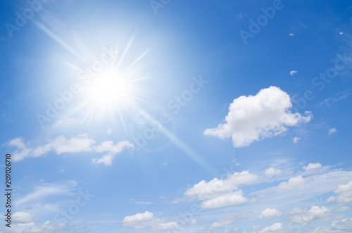Cloudy and blue sky with sun ray effect abstract background