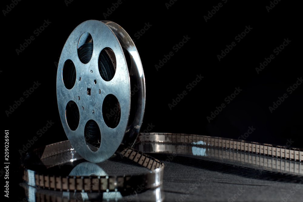 Movie film reel on dark