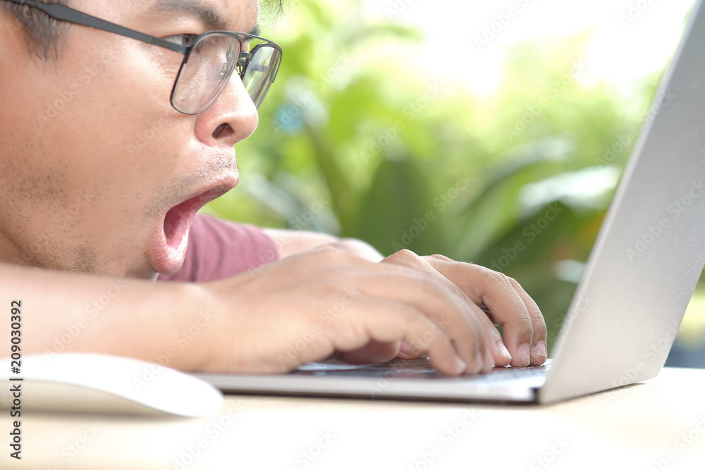 The expression of men When working in front of a computer The expression of men When working in front of a computer